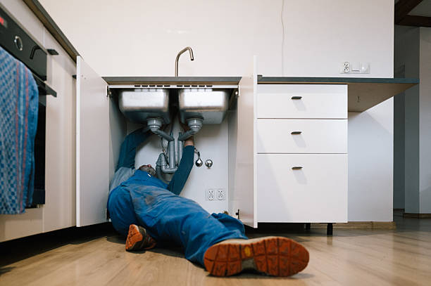 Professional Drain Cleaning technician working in Istachatta, FL